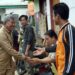 Pj Wali Kota Kunjungi Korban Banjir dan Tanah Longsor di Kelurahan Mandonga